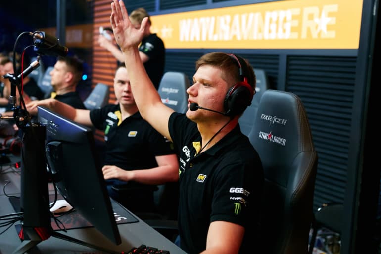 Image of s1mple pumping up the crowd at a CSGO event