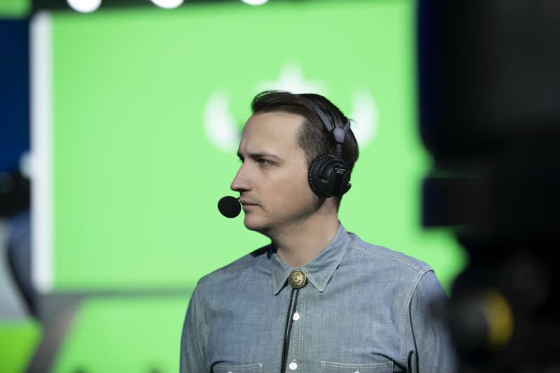 Overwatch caster MonteCristo stares ahead during an esports match at Blizzard Arena