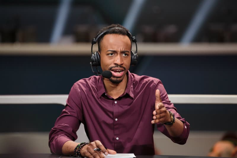 Overwatch League host Malik Forte looks confused at comments made on the desk