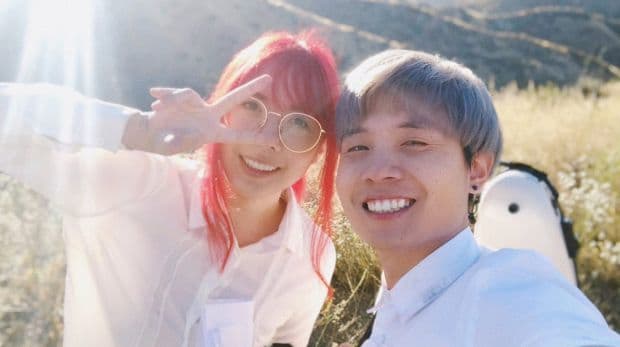 LilyPichu and Albert Chang in a field