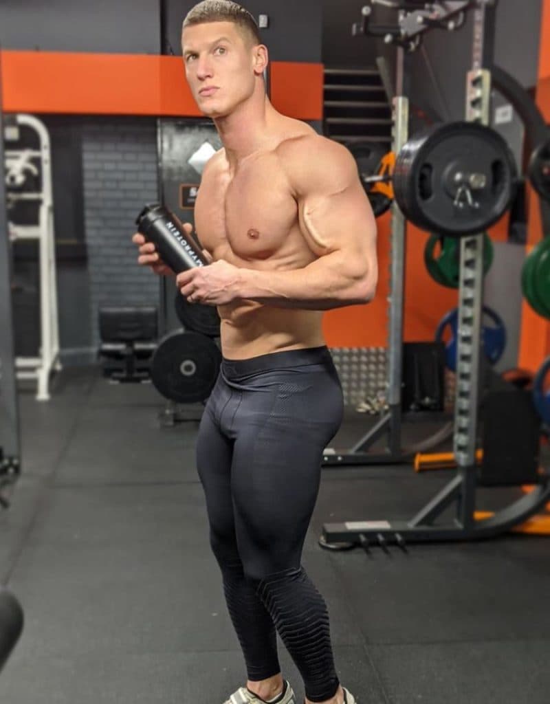 MattDoesFitness poses for a photo in the gym.