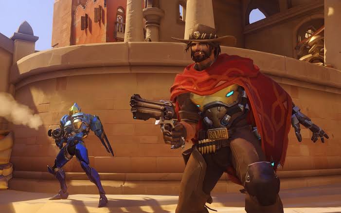 Overwatch McCree and Pharah engage in a team fight on Temple of Anubis