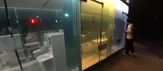 Man enters public washroom in Tokyo, Japan
