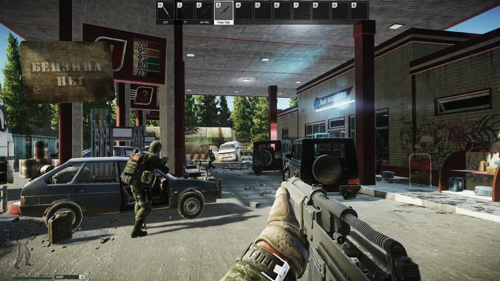 A player running into a gas station on Escape From Tarkov.
