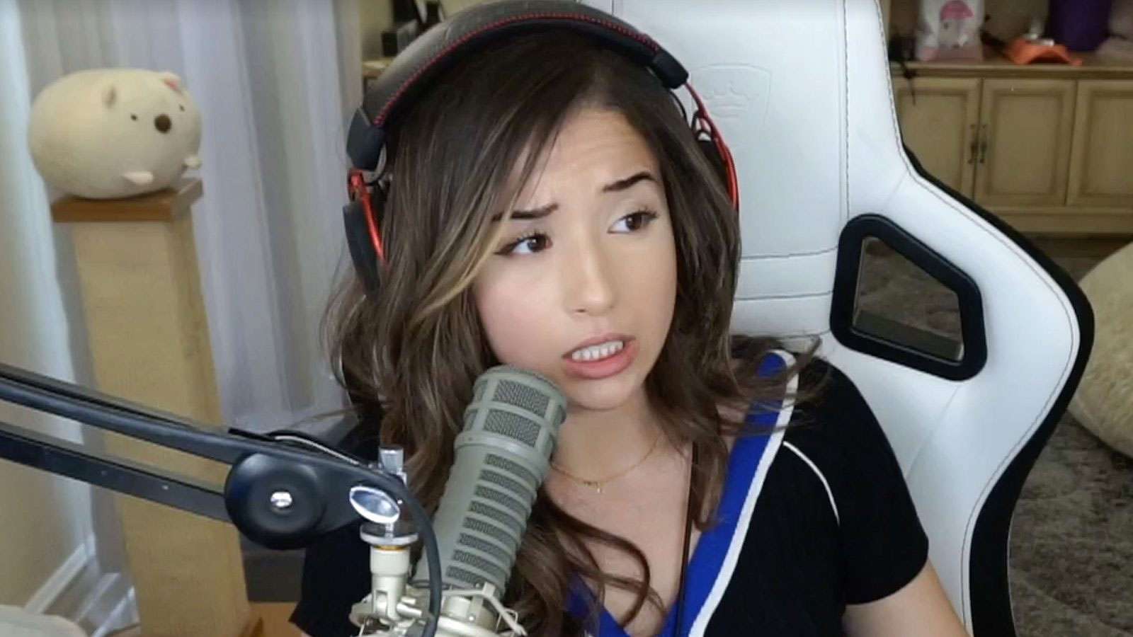 Pokimane looking confused while Twitch streaming