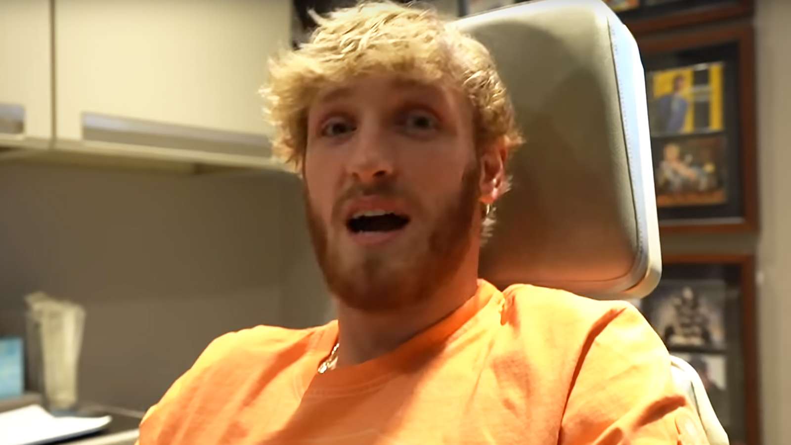 Logan Paul discussing his nose injury in a doctor's office.