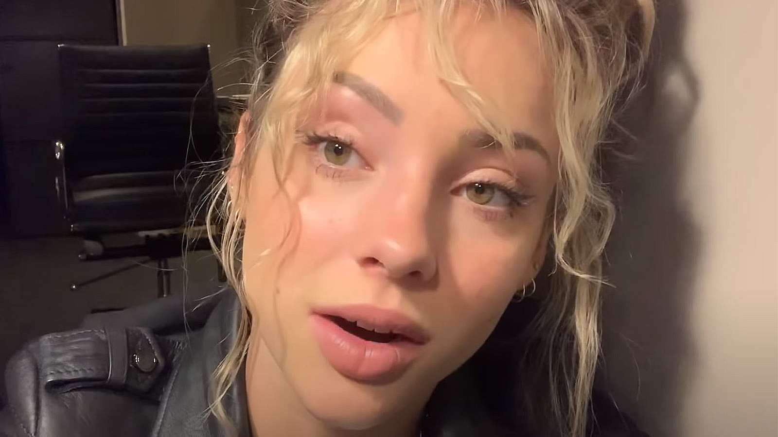 Charly Jordan speaks to the camera during a vlog.