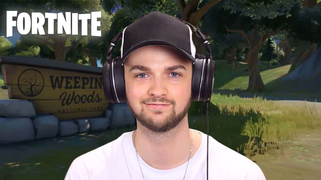 Ali-A inside Weeping Woods with the Fortnite logo