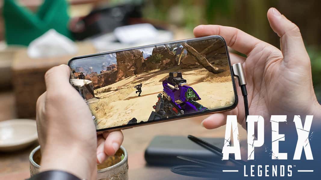 person playing Apex Legends on phone