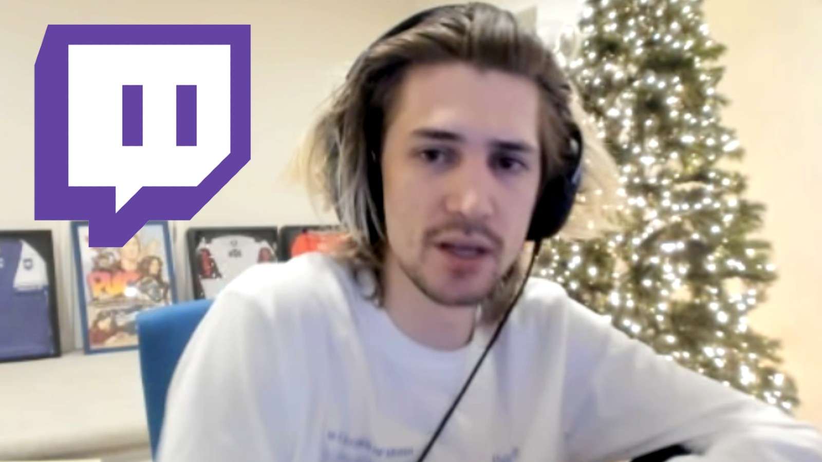 xQc in front of a tree with lights on, next to the Twitch logo