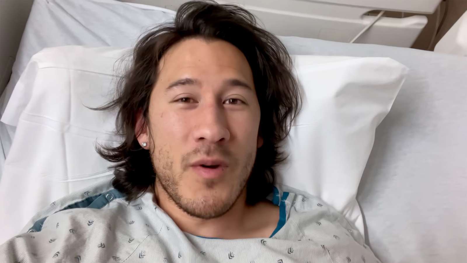 Markiplier laying in hospital bed