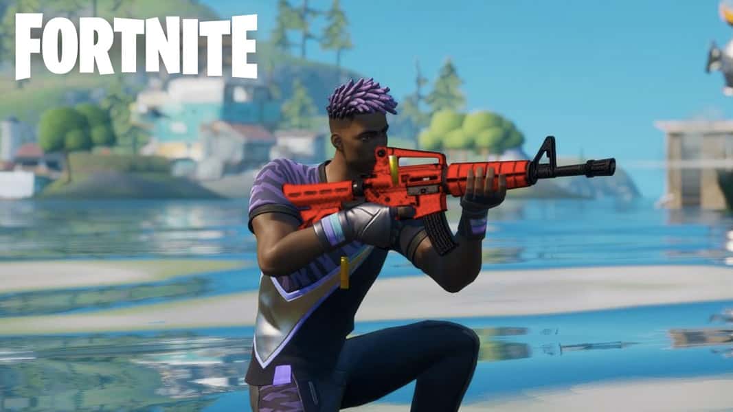 Fortnite character kneeling down with a red assault rifle