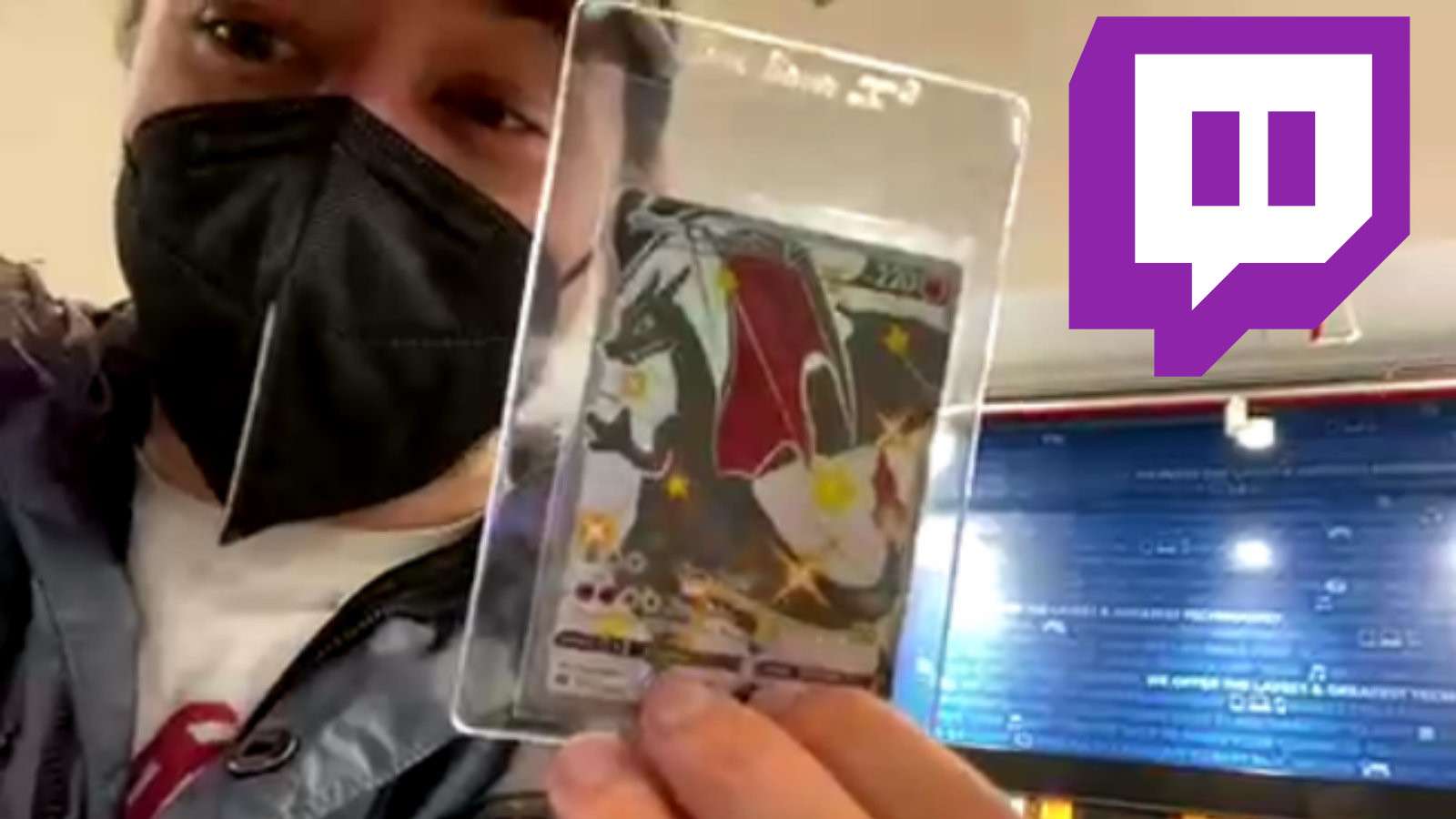 Rich Campbell is given a Charizard card from a fan