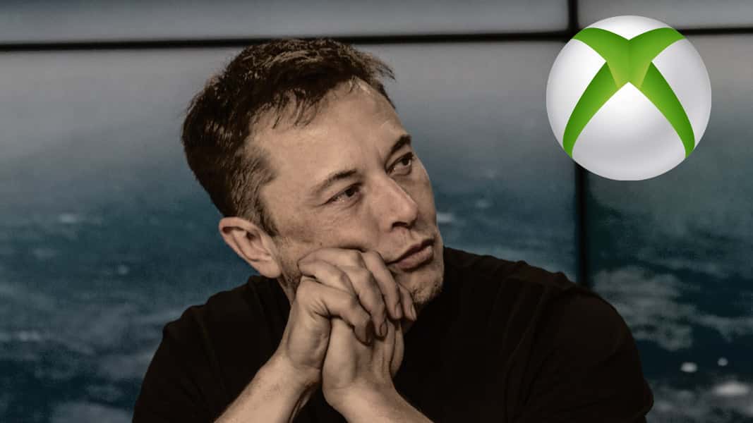Elon Musk looking at the XBox logo