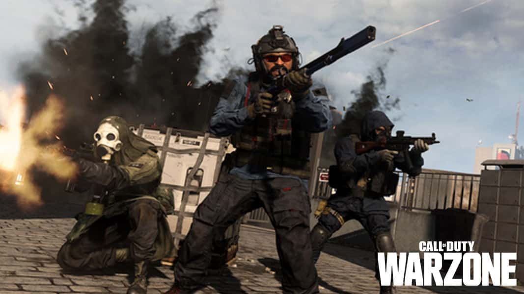 Trio of Warzone characters protecting a loadout drop amid explosions