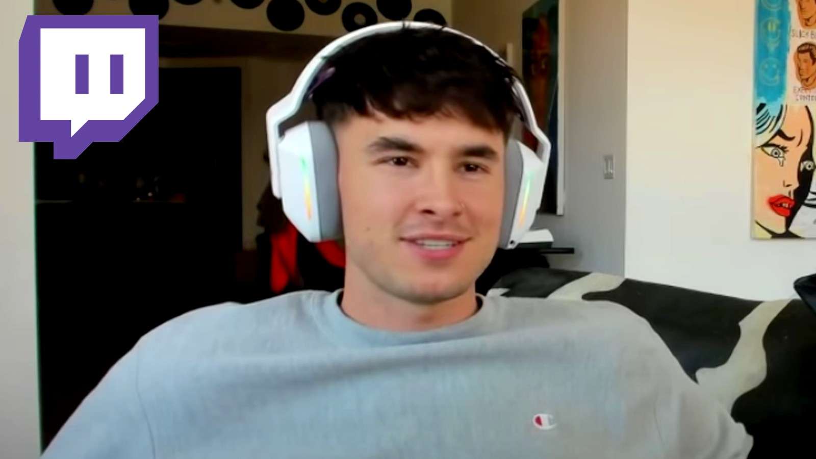 Kian Lawley whilst streaming next to the Twitch logo