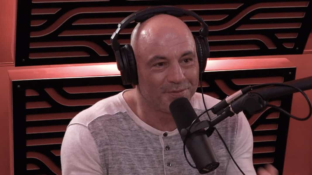 Joe Rogan smiling and talking on JRE Podcast