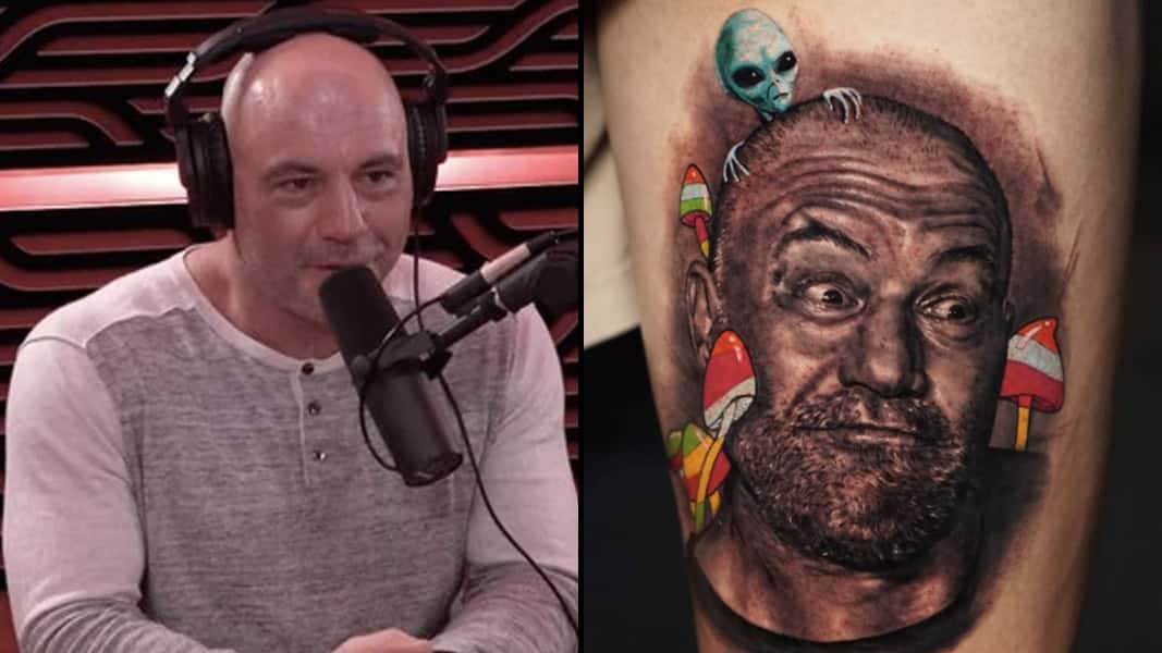 Joe Rogan talking to a mic next to a tattoo of his face