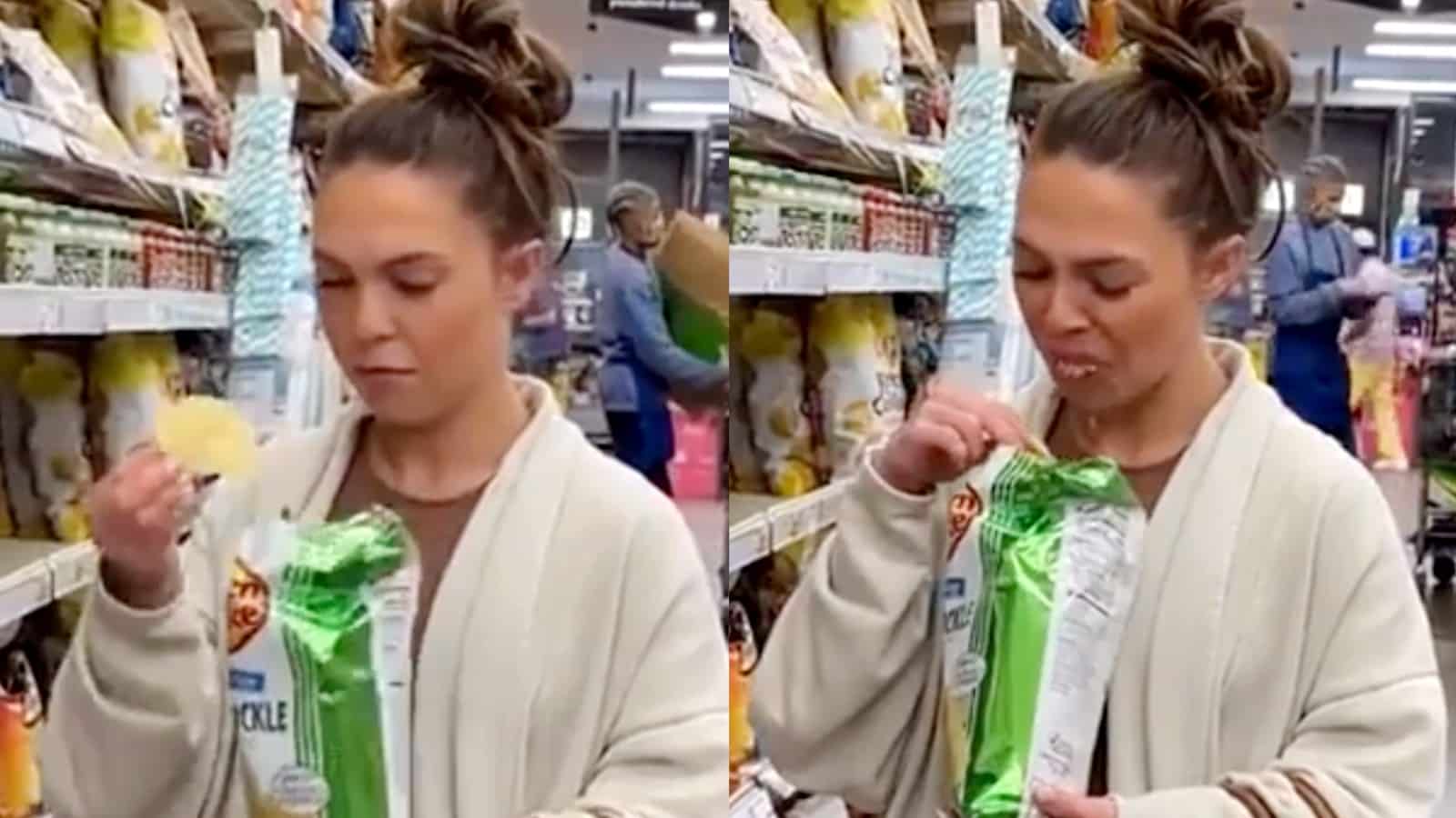 Woman eats a chip at a grocery store