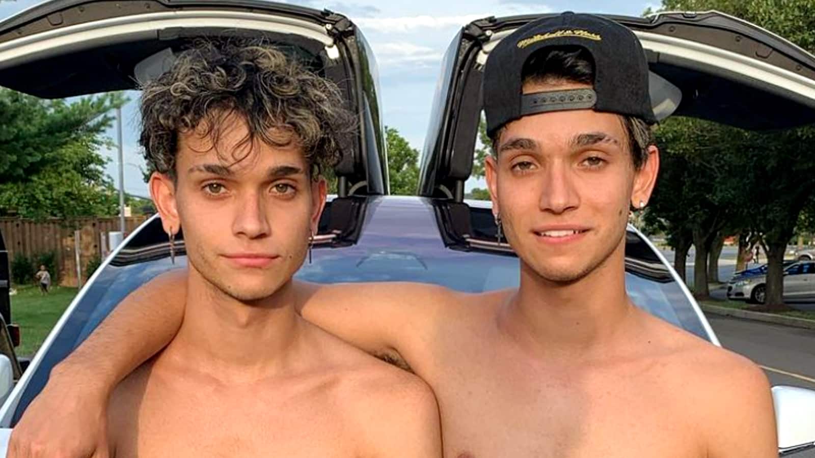 Dobre Twins smiling at the camera