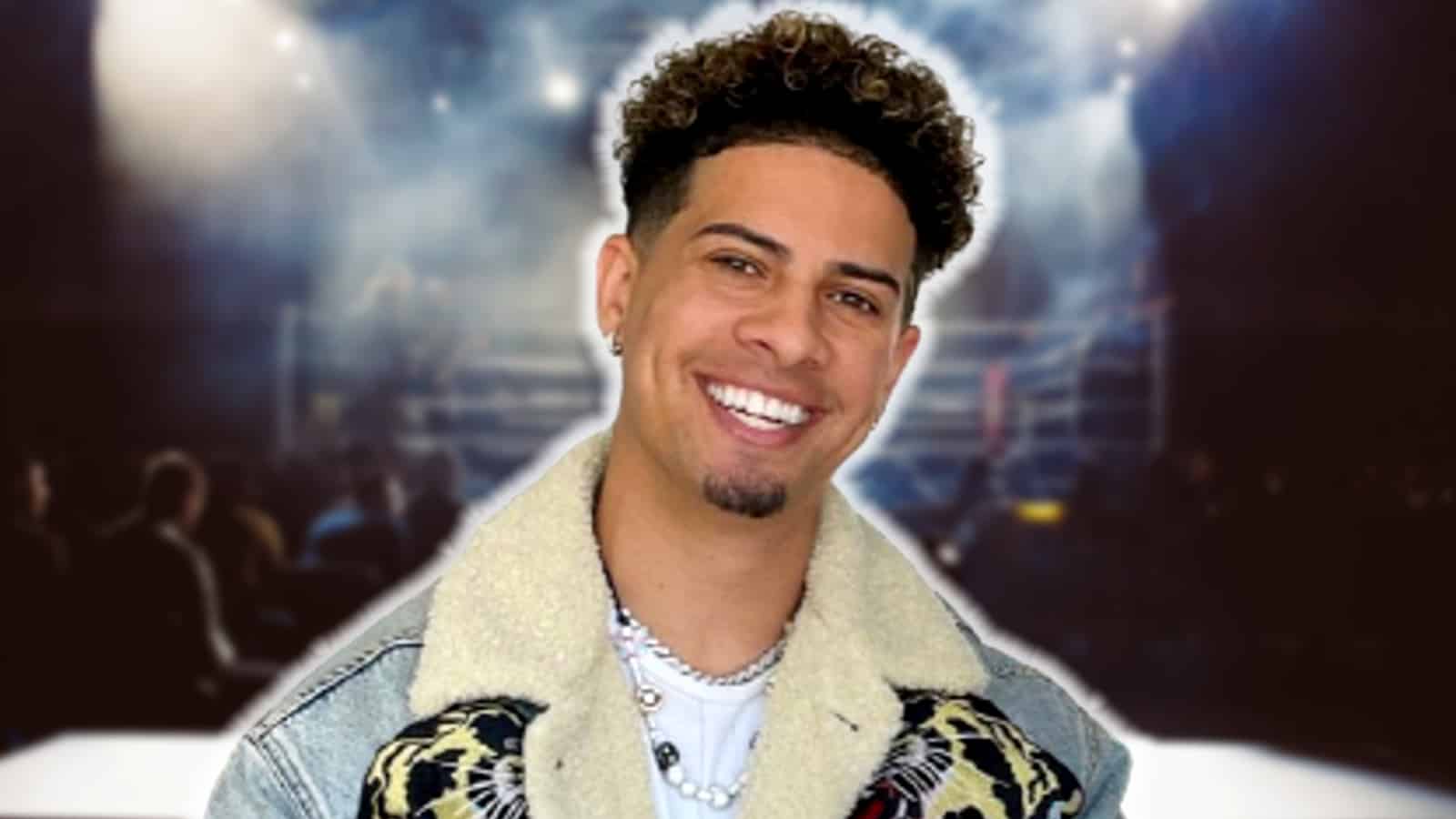 Austin McBroom in front of a boxing ring