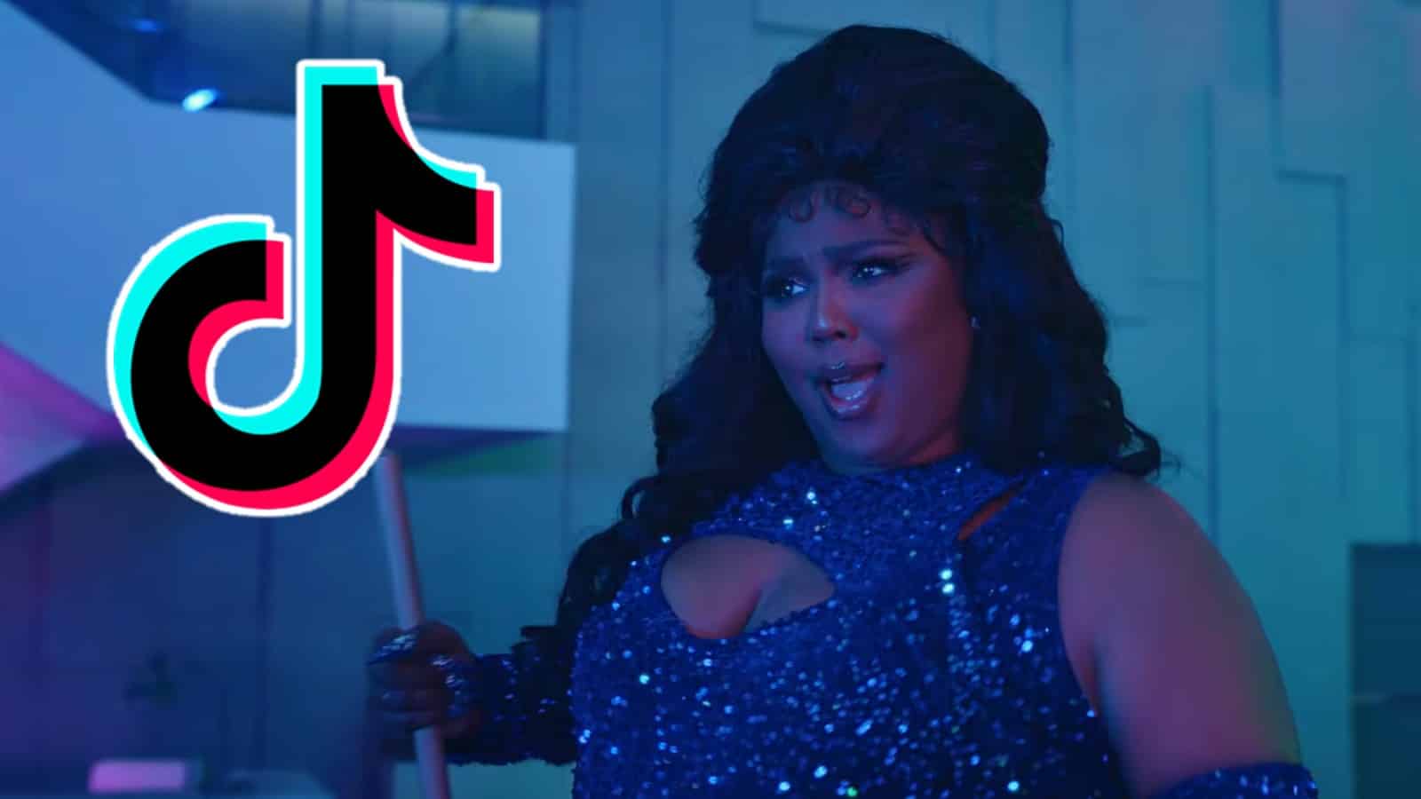 Lizzo singing in About Damn Time video with TikTok logo