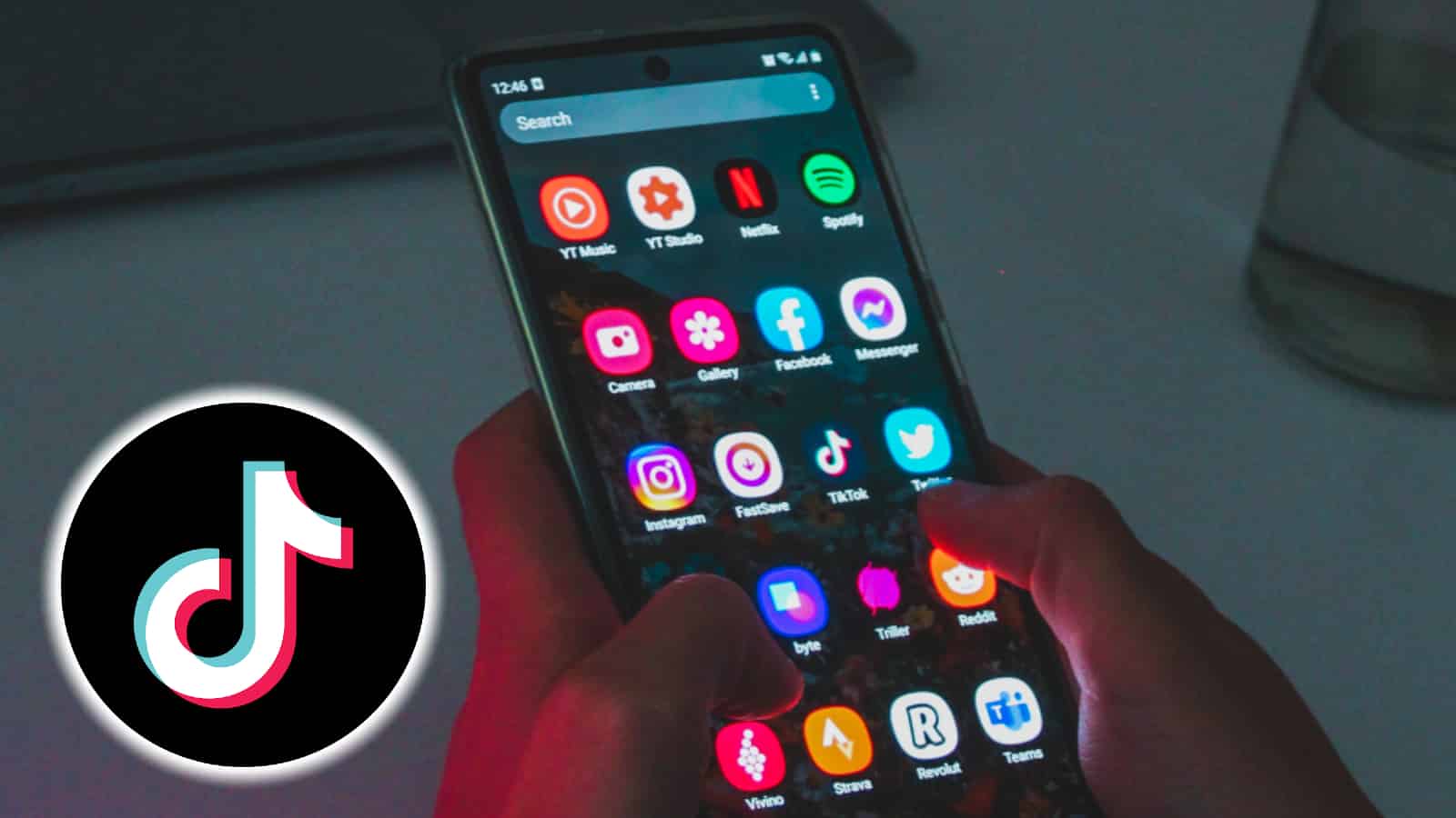 TikTok logo next to phone with apps on