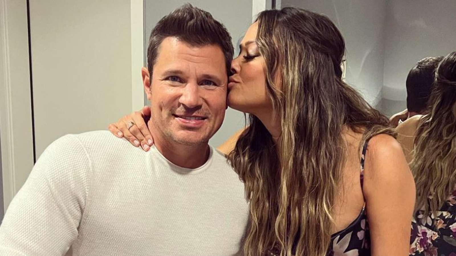 Nick and Vanessa Lachey posing for a photo