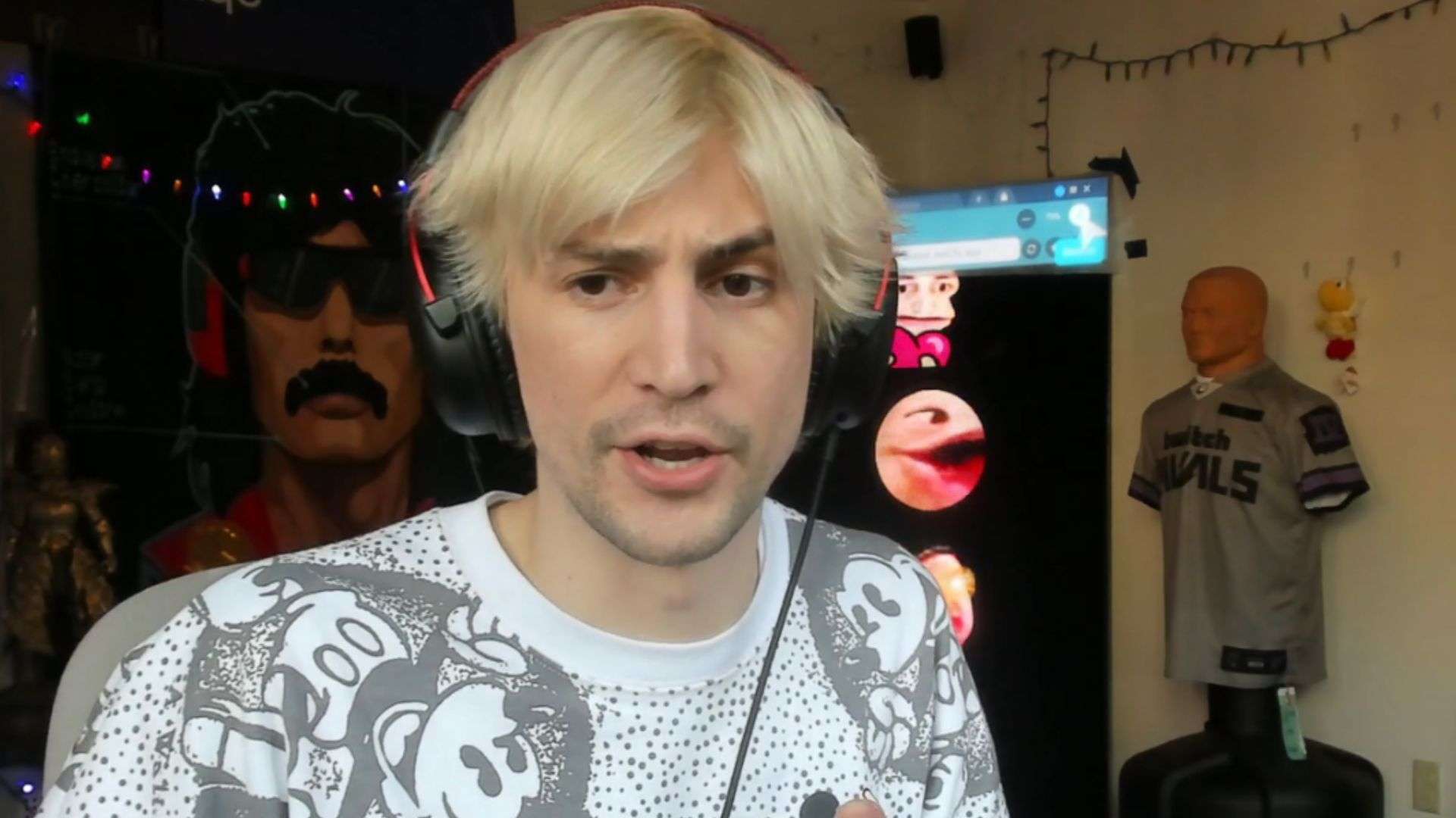 xQc in twitch and grey shirt looking at camera