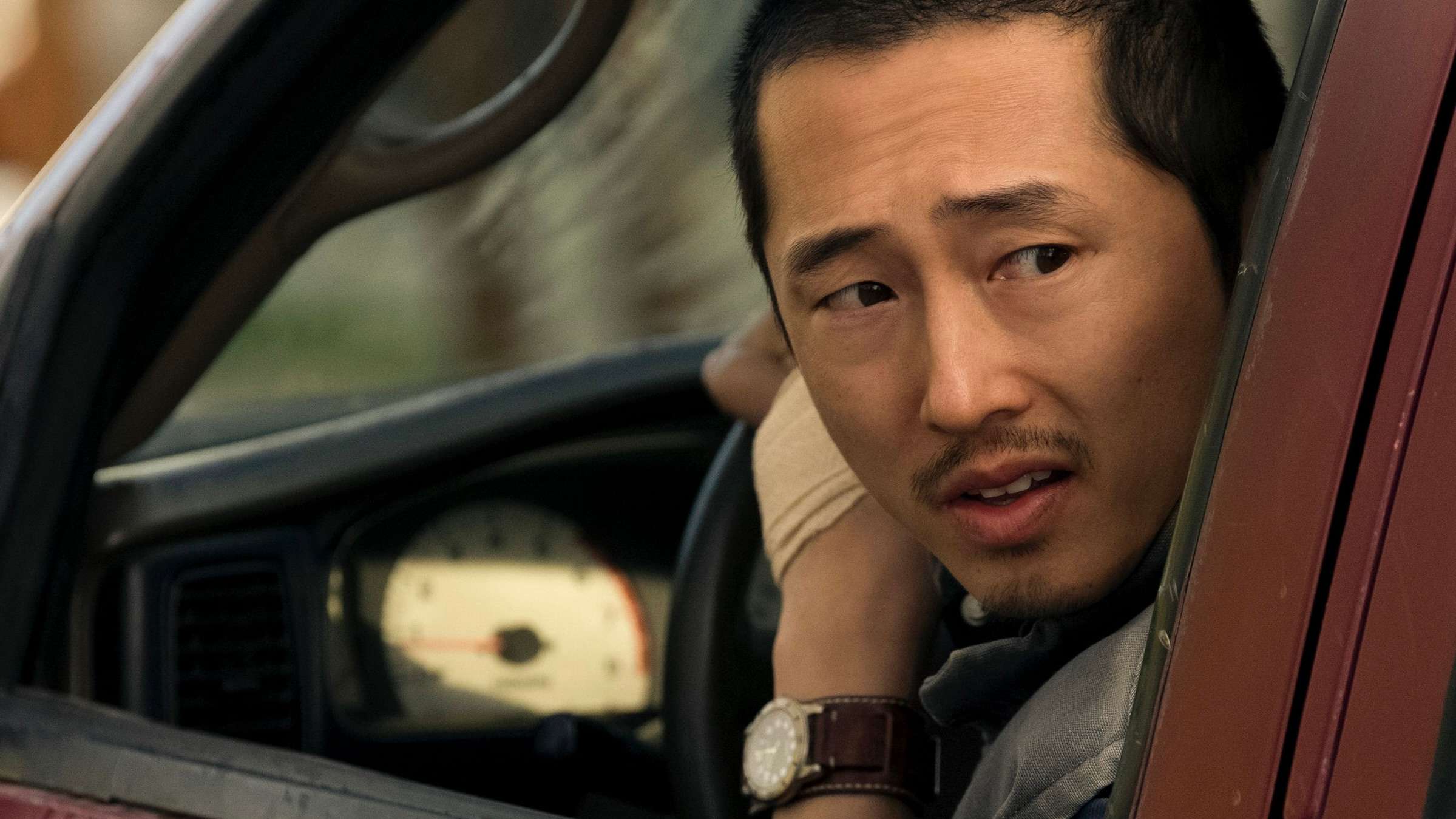 Steven Yuen in his car in Netflix thriller Beef.