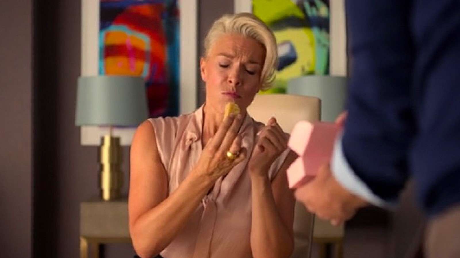 Hannah Waddingham in Ted Lasso Season 3 eating biscuits