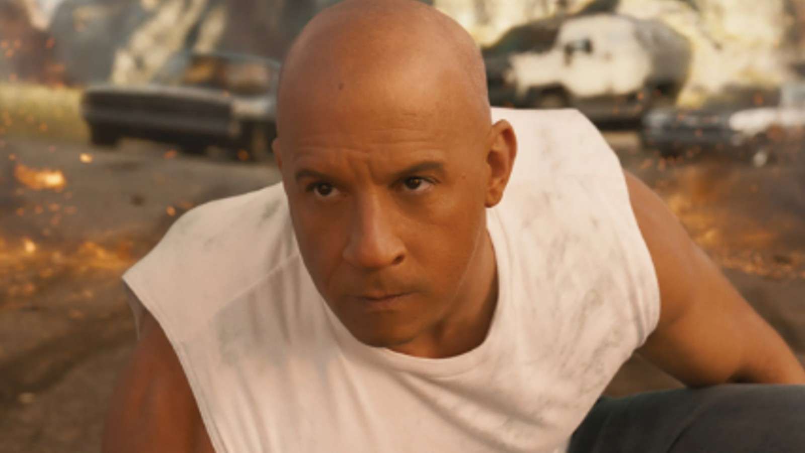 Dominic Toretto stands in front of an explosion in Fast X