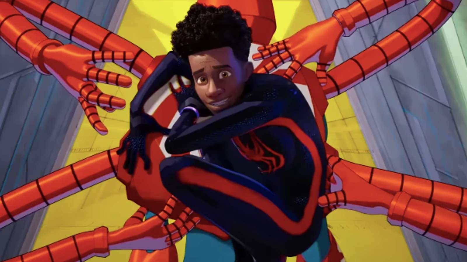 Miles Morales hides on the back of a Spider-person in Spider-Man: Across the Spider-Verse