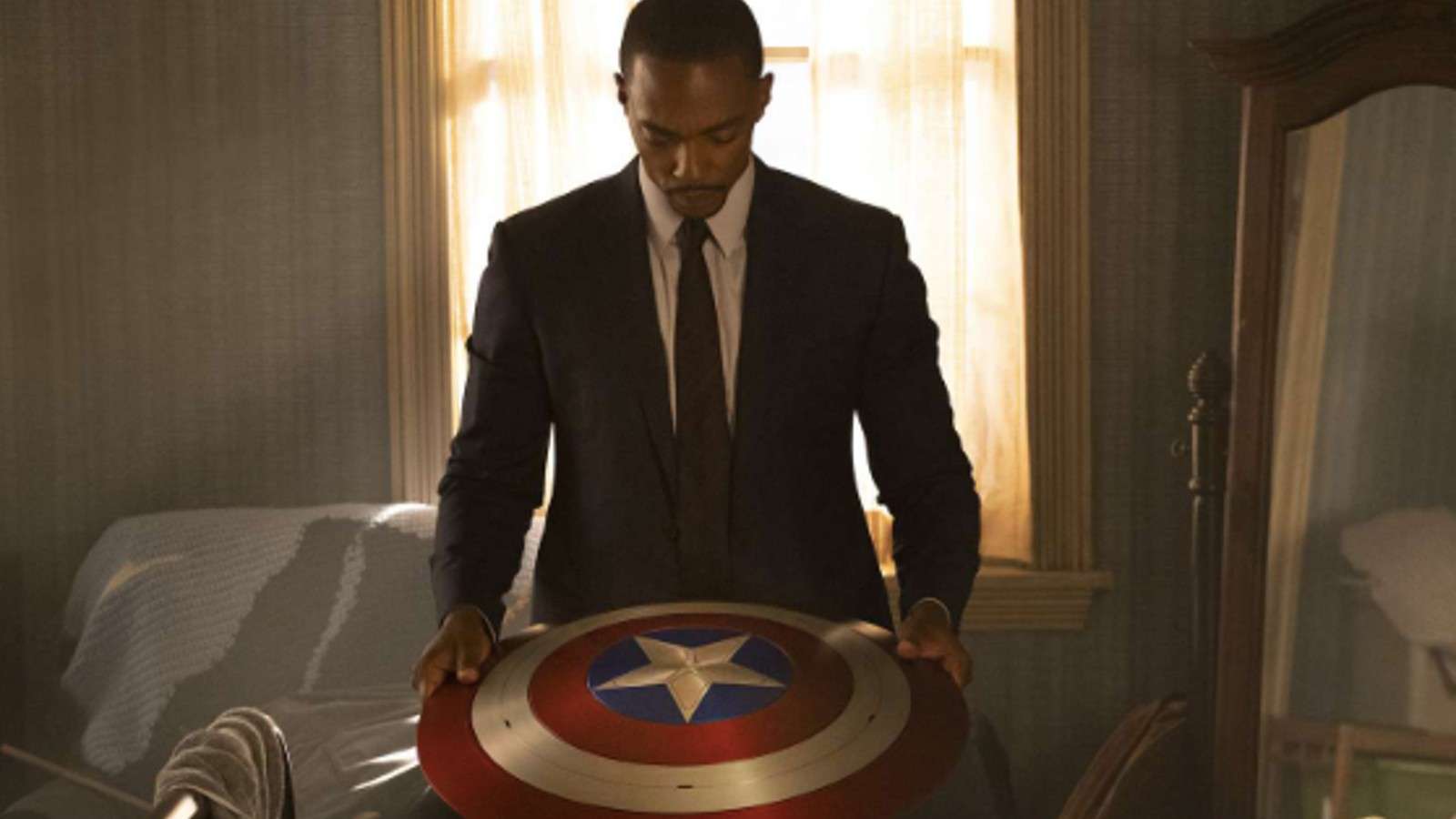 Sam Wilson holds the Captain America shield