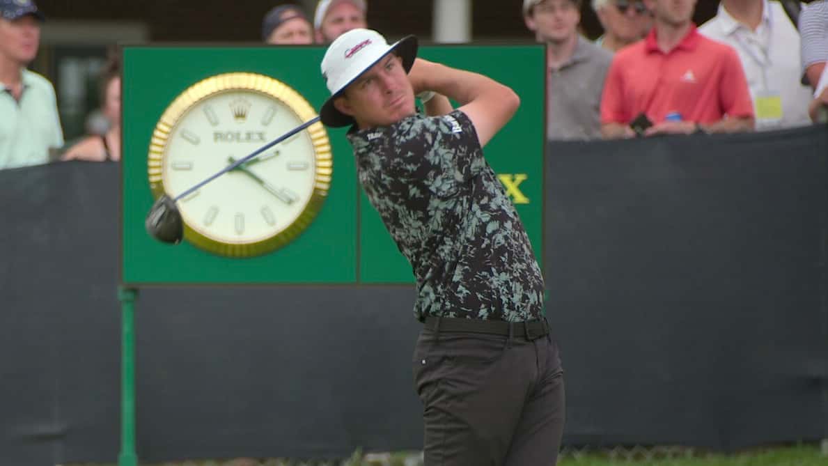 A golfer tees off in Full Swing.