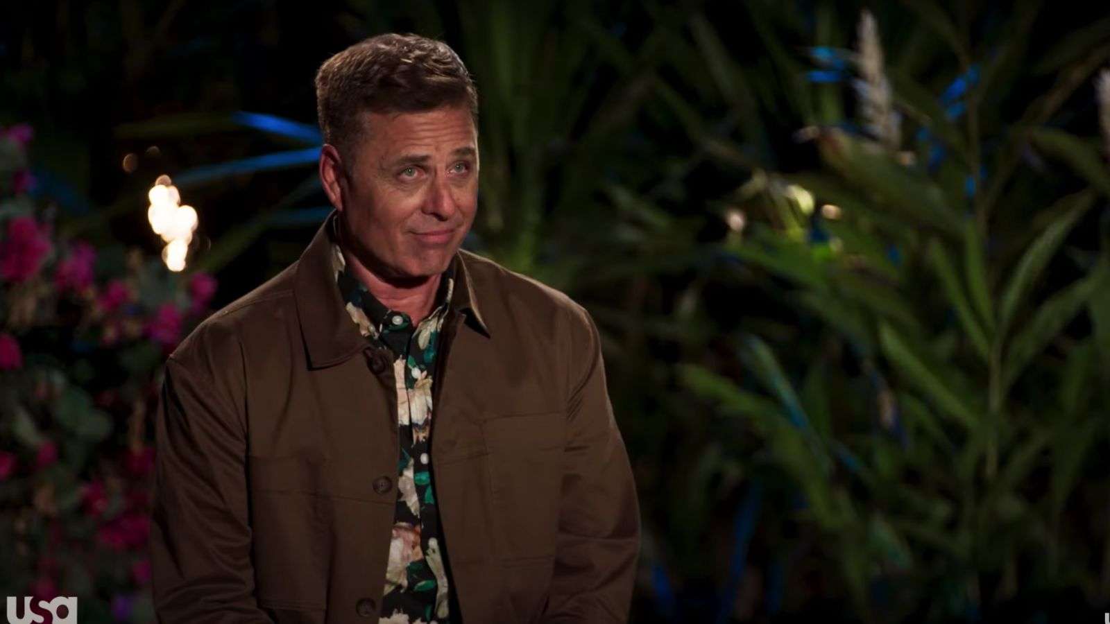 Host Mark L. Walberg of Temptation Island at the bonfire in season 5