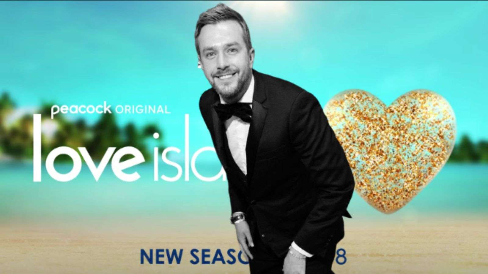 Love Island narrator Iain Stirling posing for Instagram with Love Island back drop