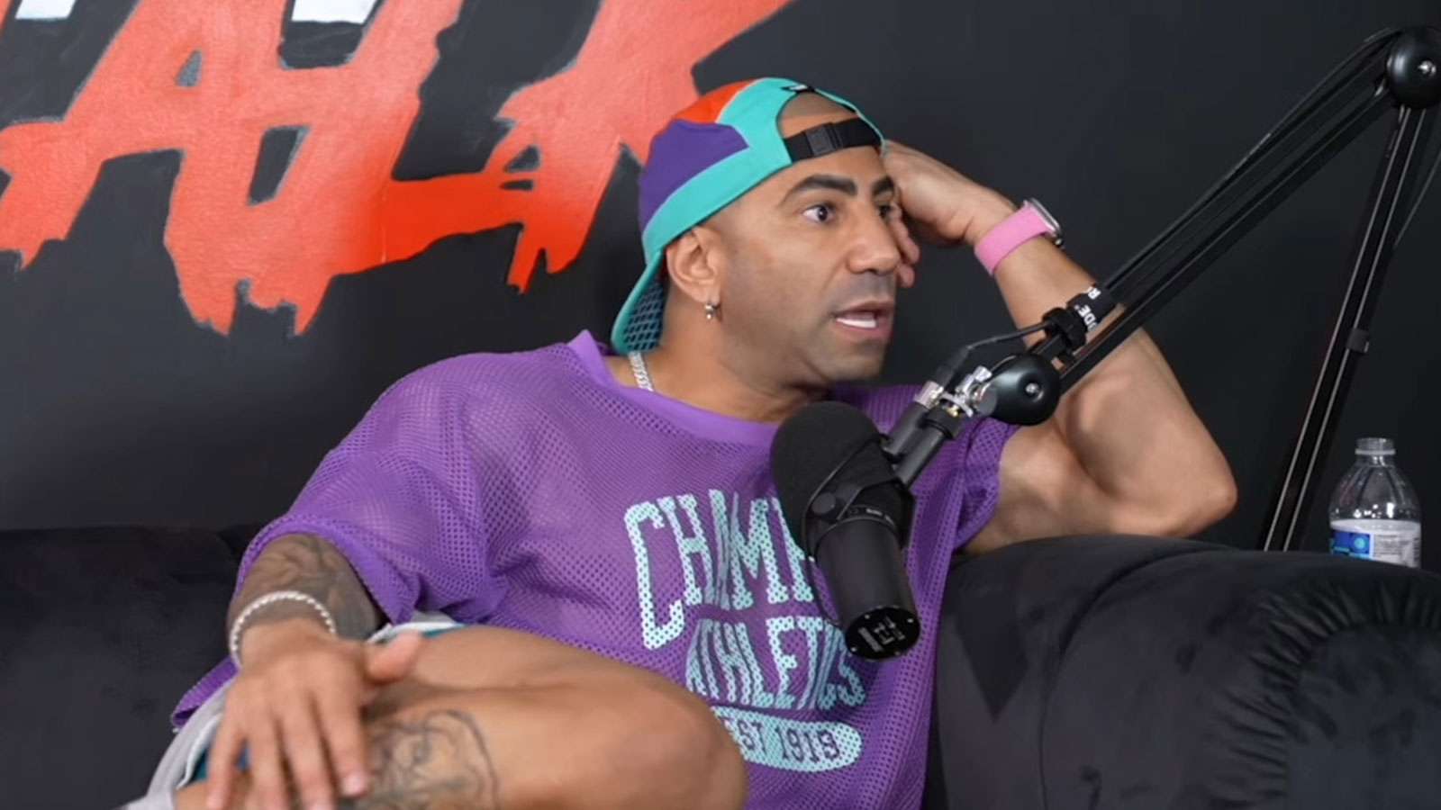 Fousey lay on couch on Raw Talk podcast set