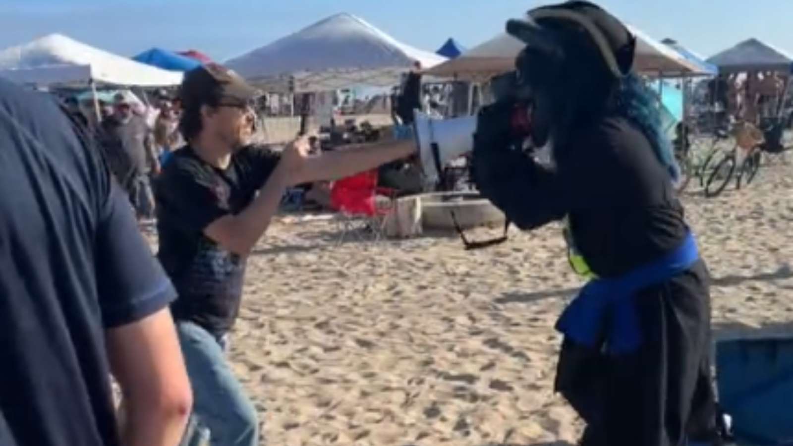 furry attacks man with megaphone