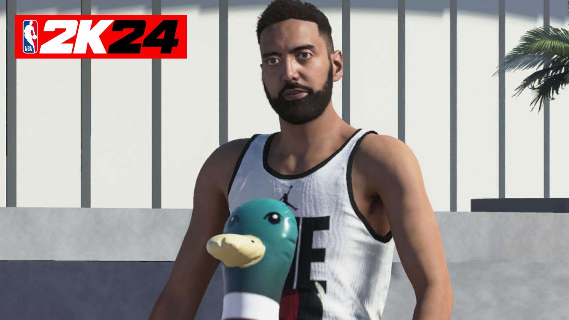 Ronnie 2K in NBA 2K24 city with beach floatie and white shirt on
