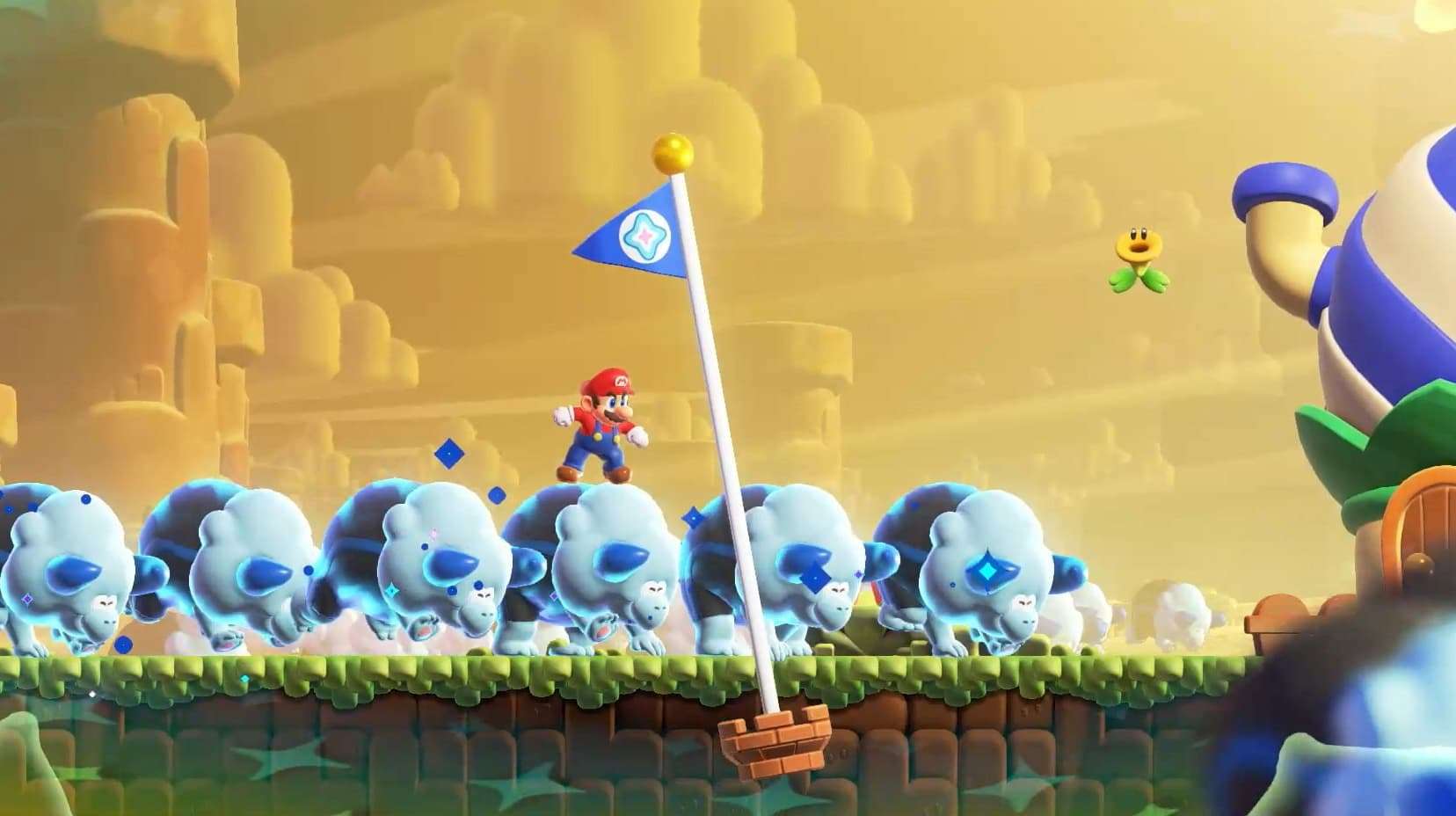 Mario riding rhinos to flag pole in Super Mario Bros. Wonder