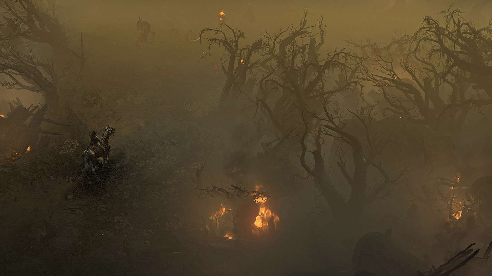 A lone player stands in a burning landscape in Diablo 4 (Helltides story)