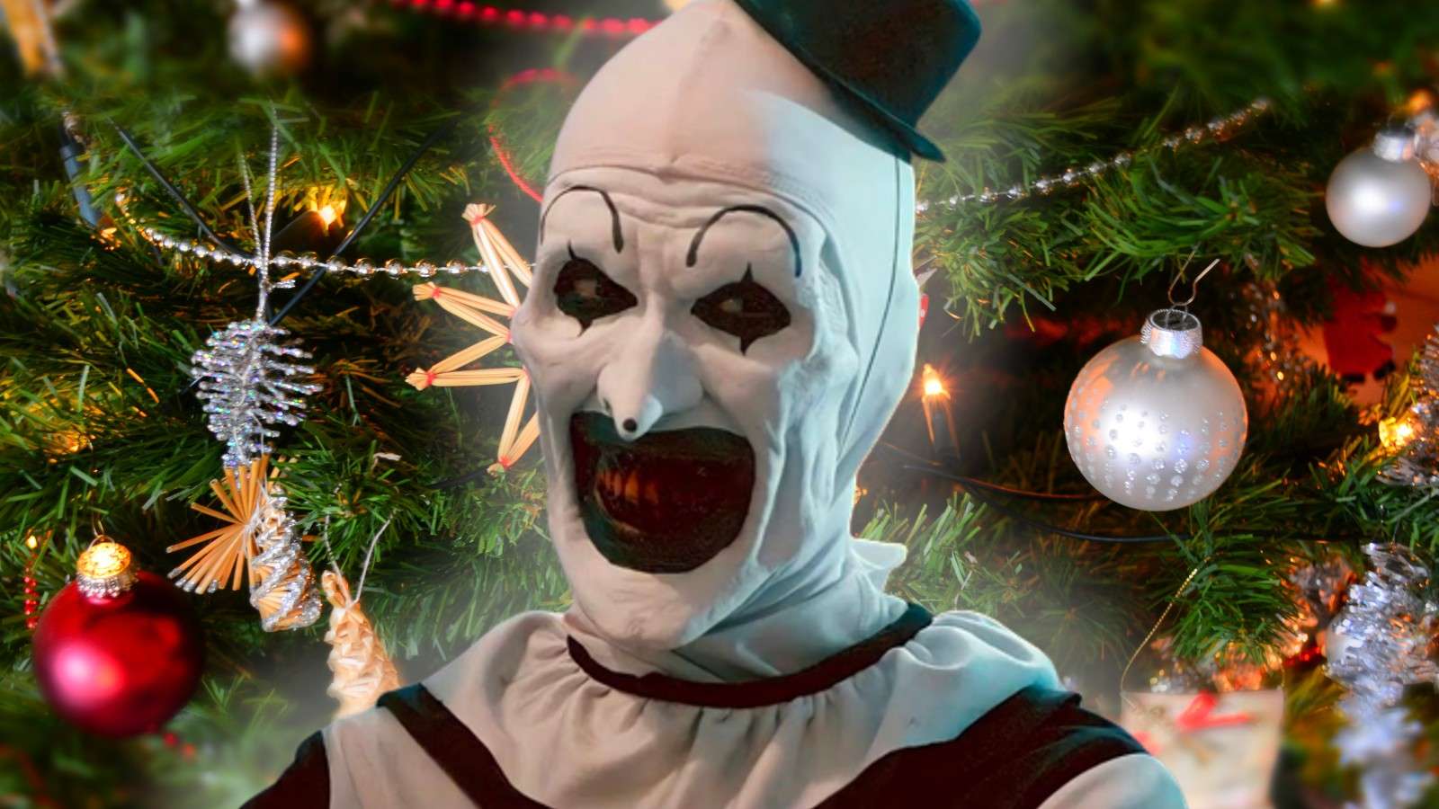 Art the Clown from Terrifier and a Christmas backdrop