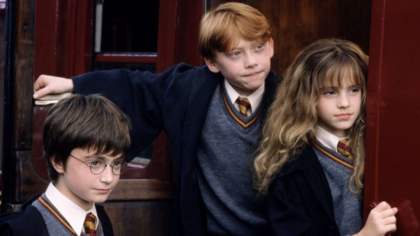 Daniel Radcliffe, Rupert Granger, and Emma Watson in Harry Potter movie
