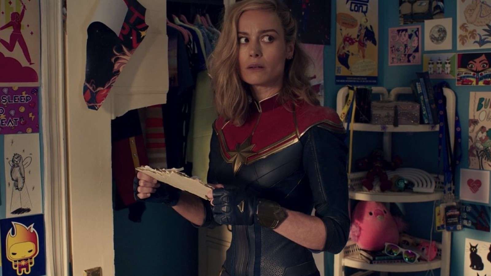 Captain Marvel in Ms. Marvel's room.