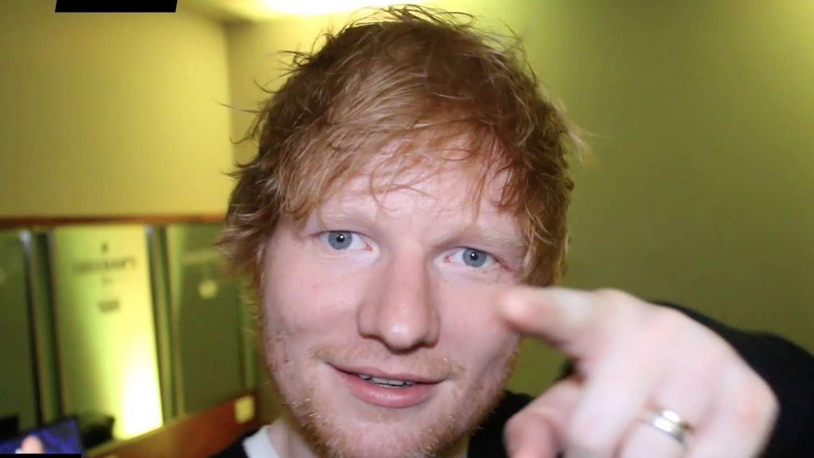 Ed Sheeran pointing at camera