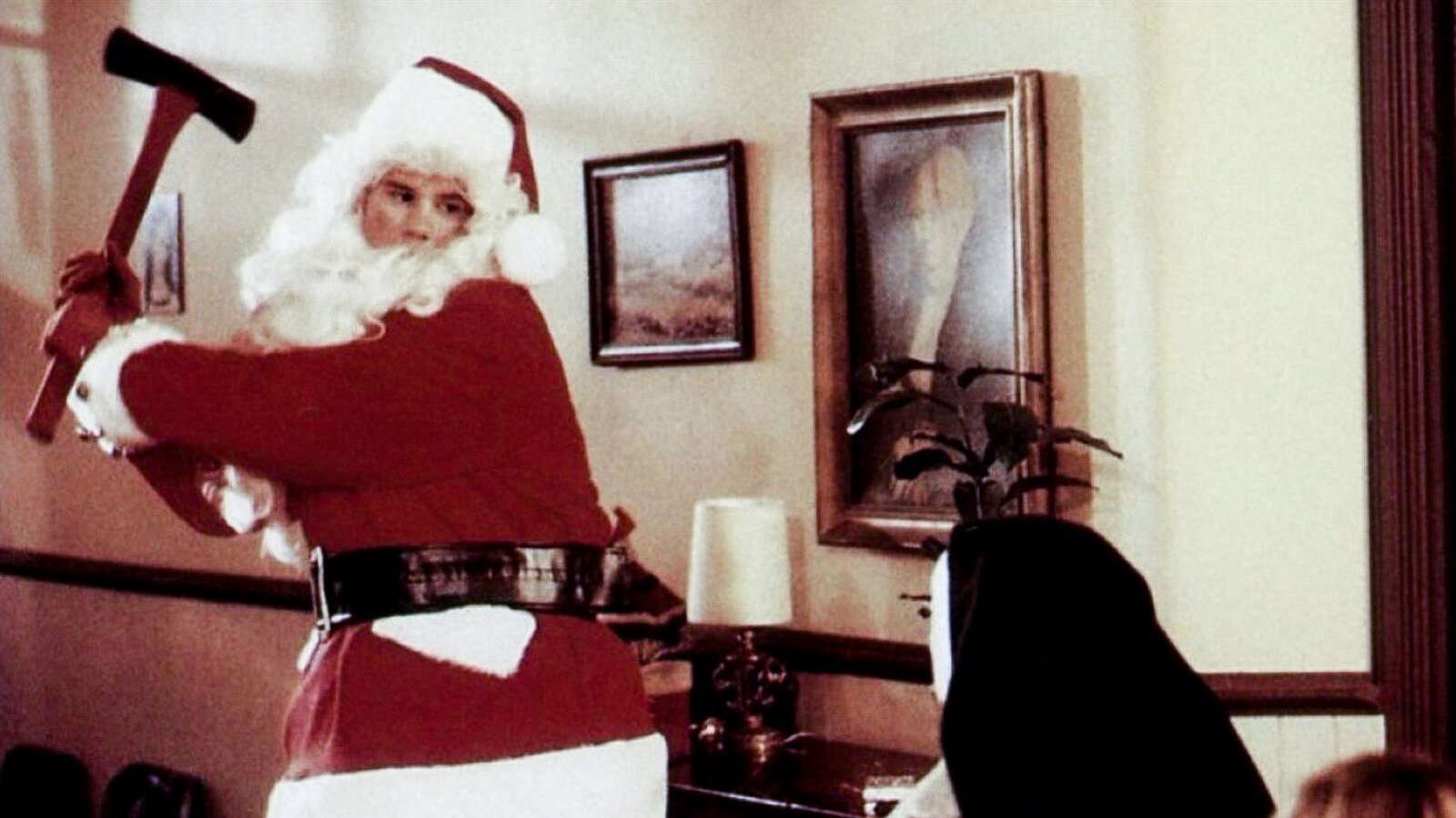 Santa swings an axe at a nun