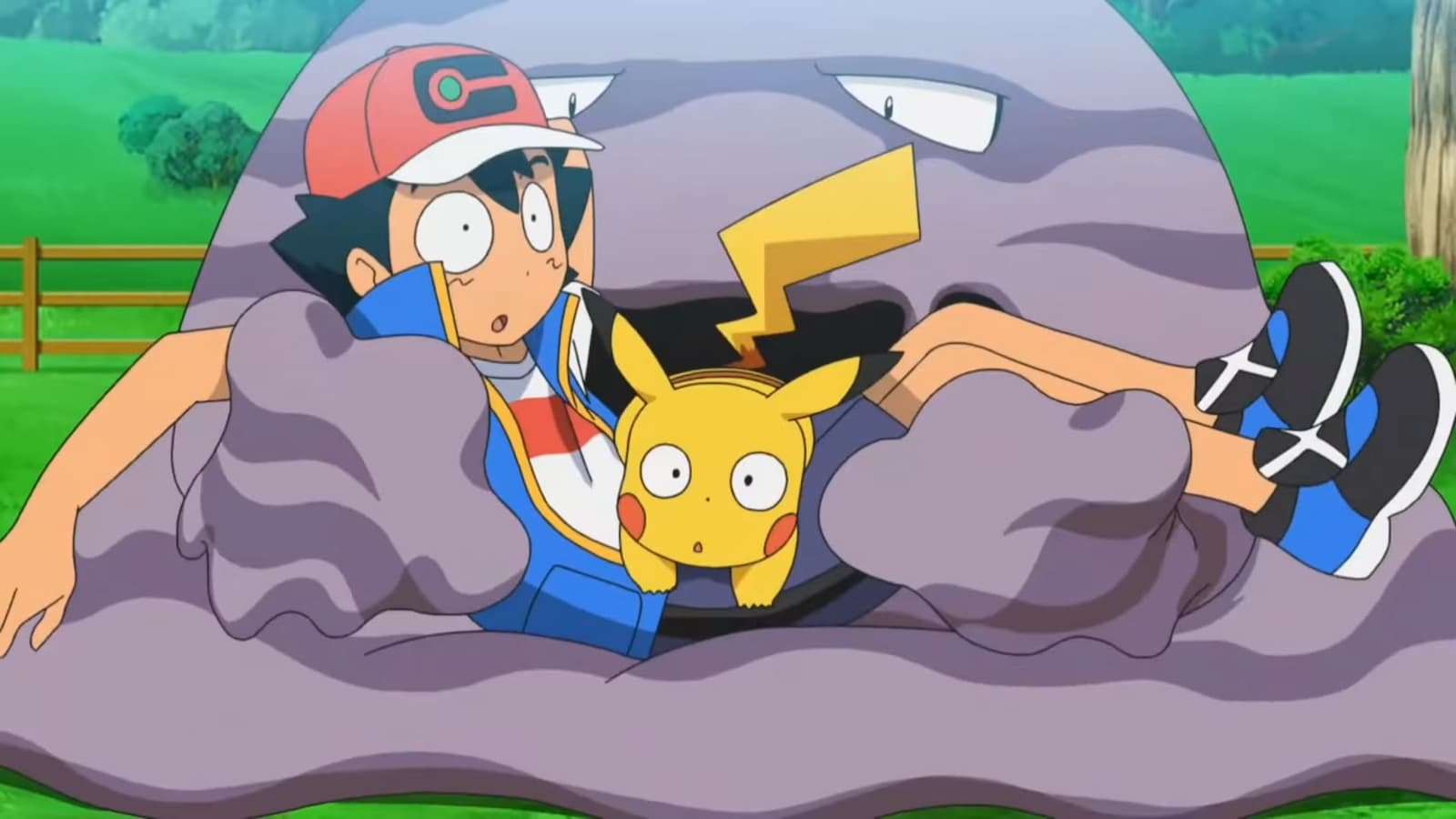 Ash and Pikachu in the grip of his Muk