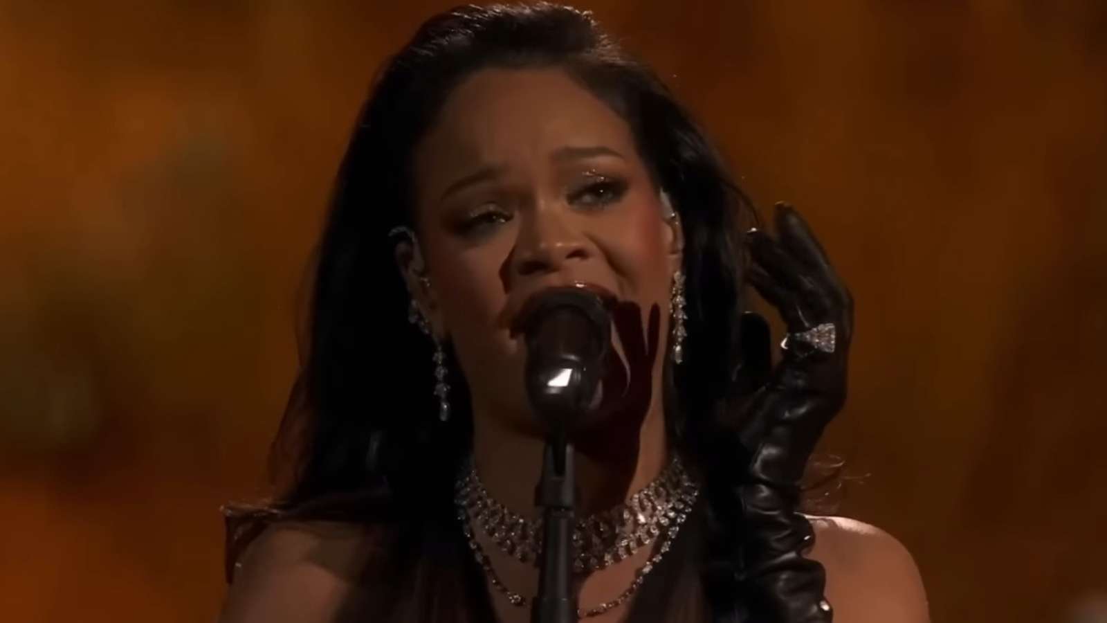 Rihanna performing onstage during an awards show