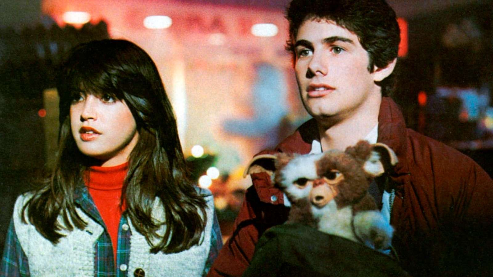 Kate and Billy, holding little Gizmo in Gremlins.